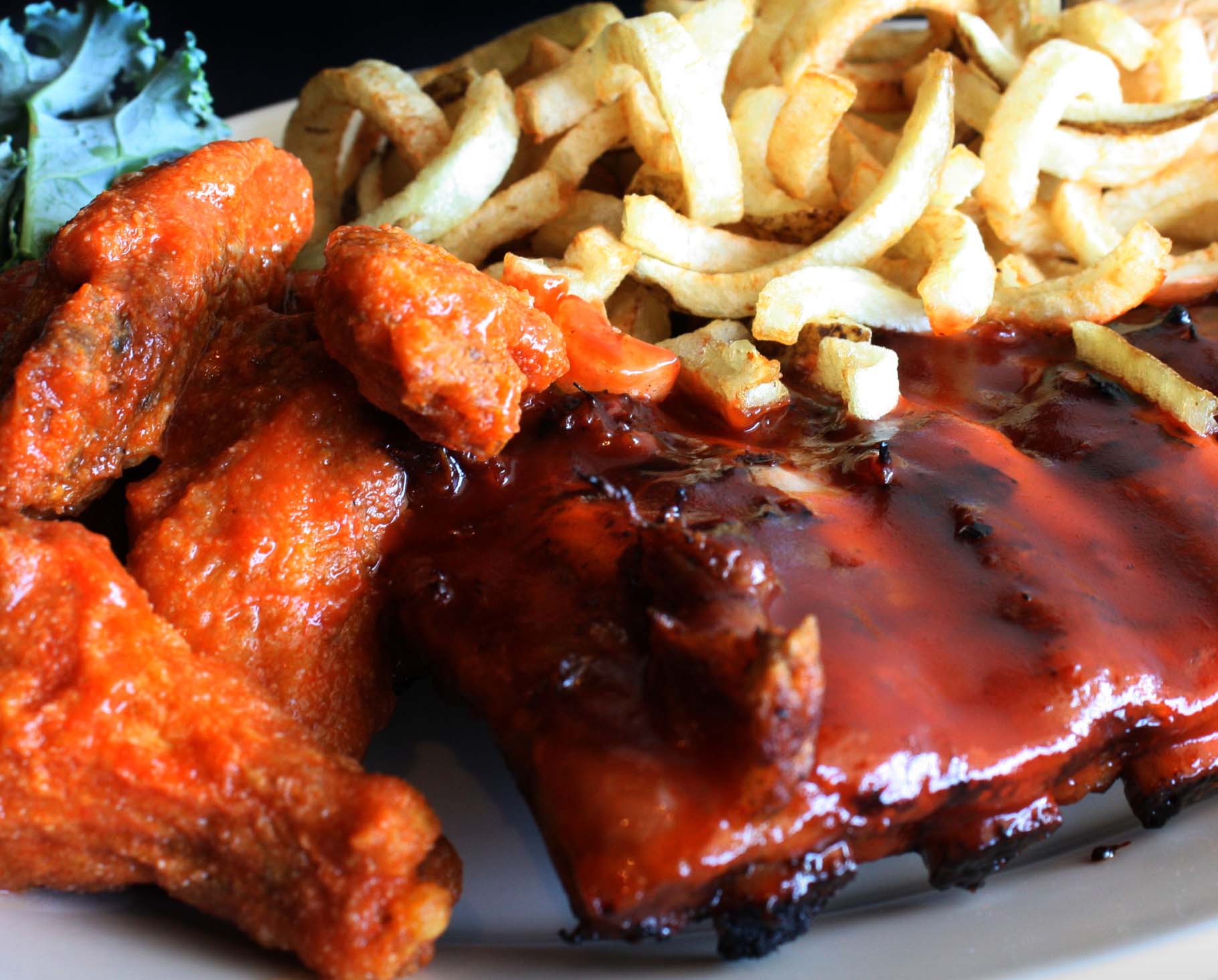 A plate of barbeque ribs